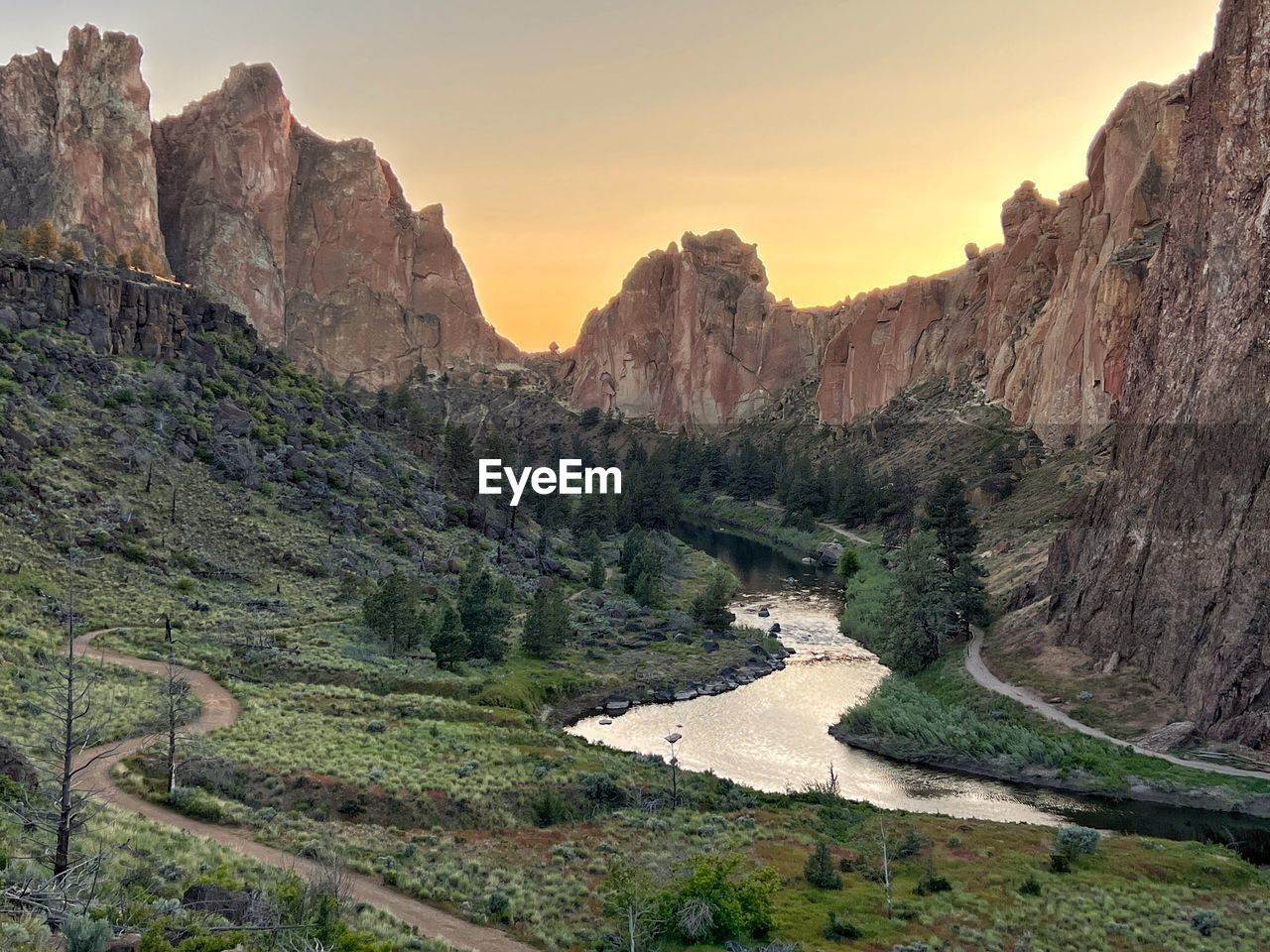 landscape, environment, scenics - nature, land, mountain, nature, beauty in nature, valley, plant, rock, sky, tree, sunset, travel destinations, travel, no people, rock formation, non-urban scene, plateau, tranquility, water, outdoors, mountain range, tourism, river, wilderness, canyon, tranquil scene, forest, geology, cliff, wadi, rural scene, social issues, terrain, idyllic, cloud, road