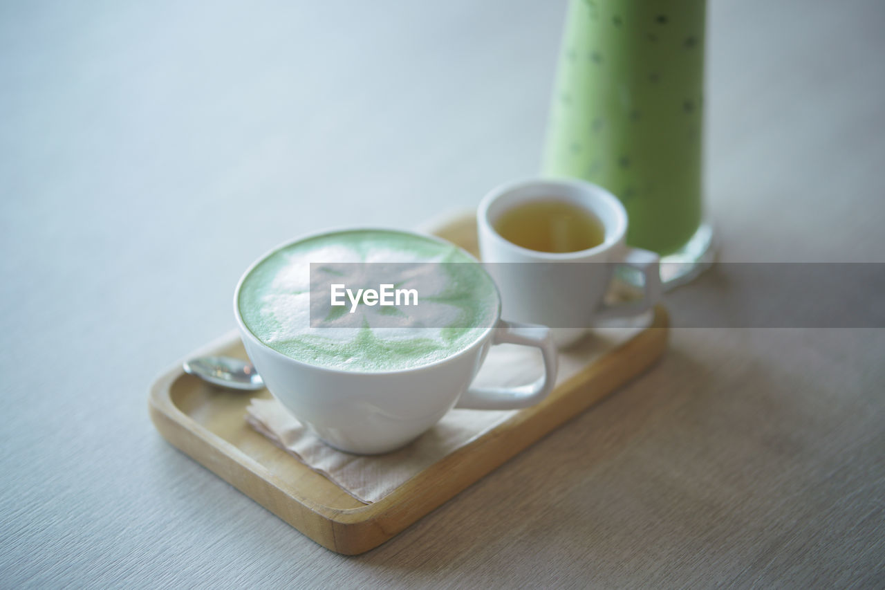 high angle view of coffee cup on table