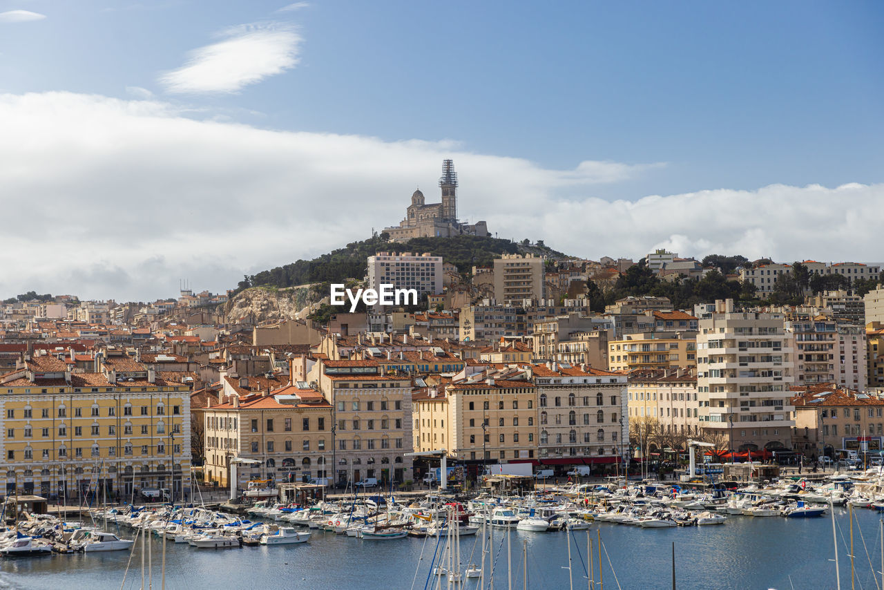 buildings in city against sky