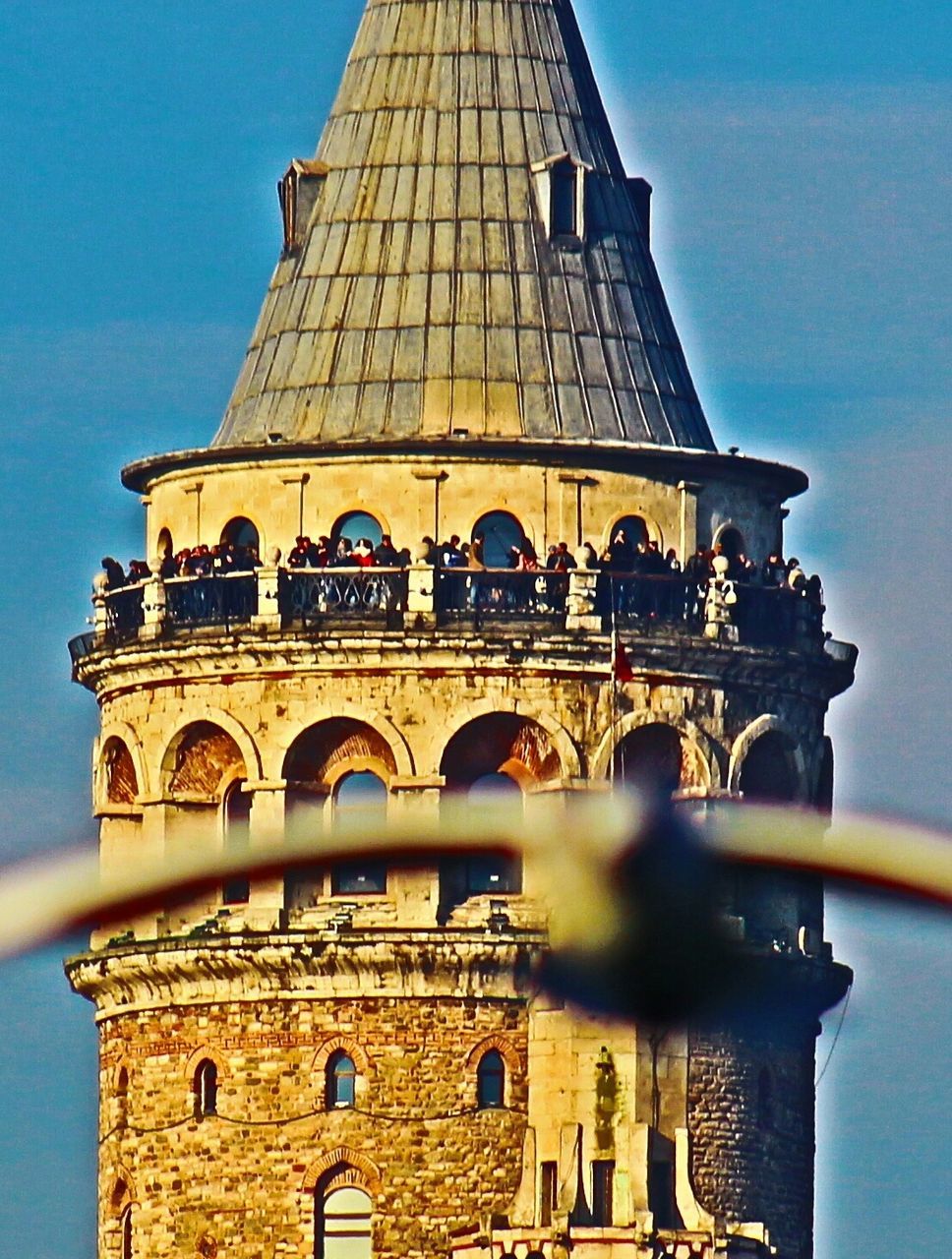 LOW ANGLE VIEW OF HISTORIC BUILDING AGAINST BLUE SKY