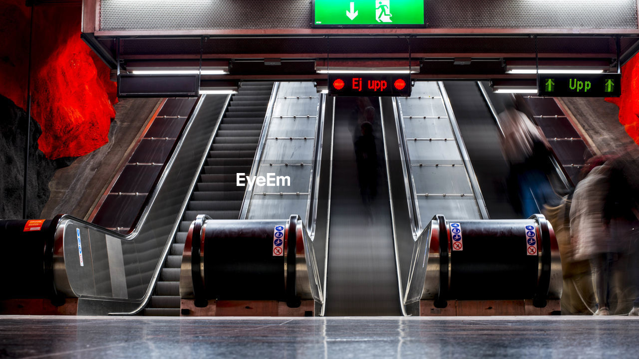 HIGH ANGLE VIEW OF ESCALATOR