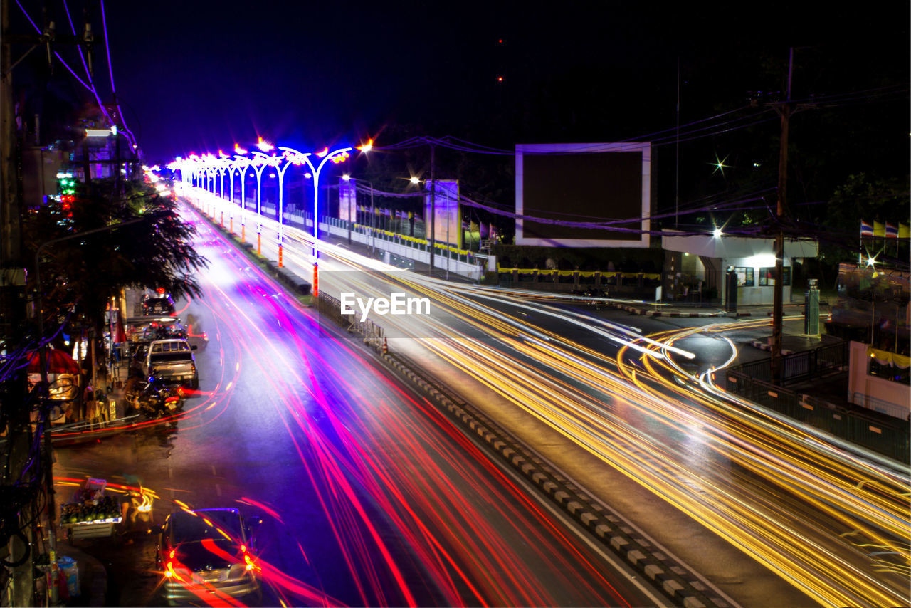 Light trails on city street at night