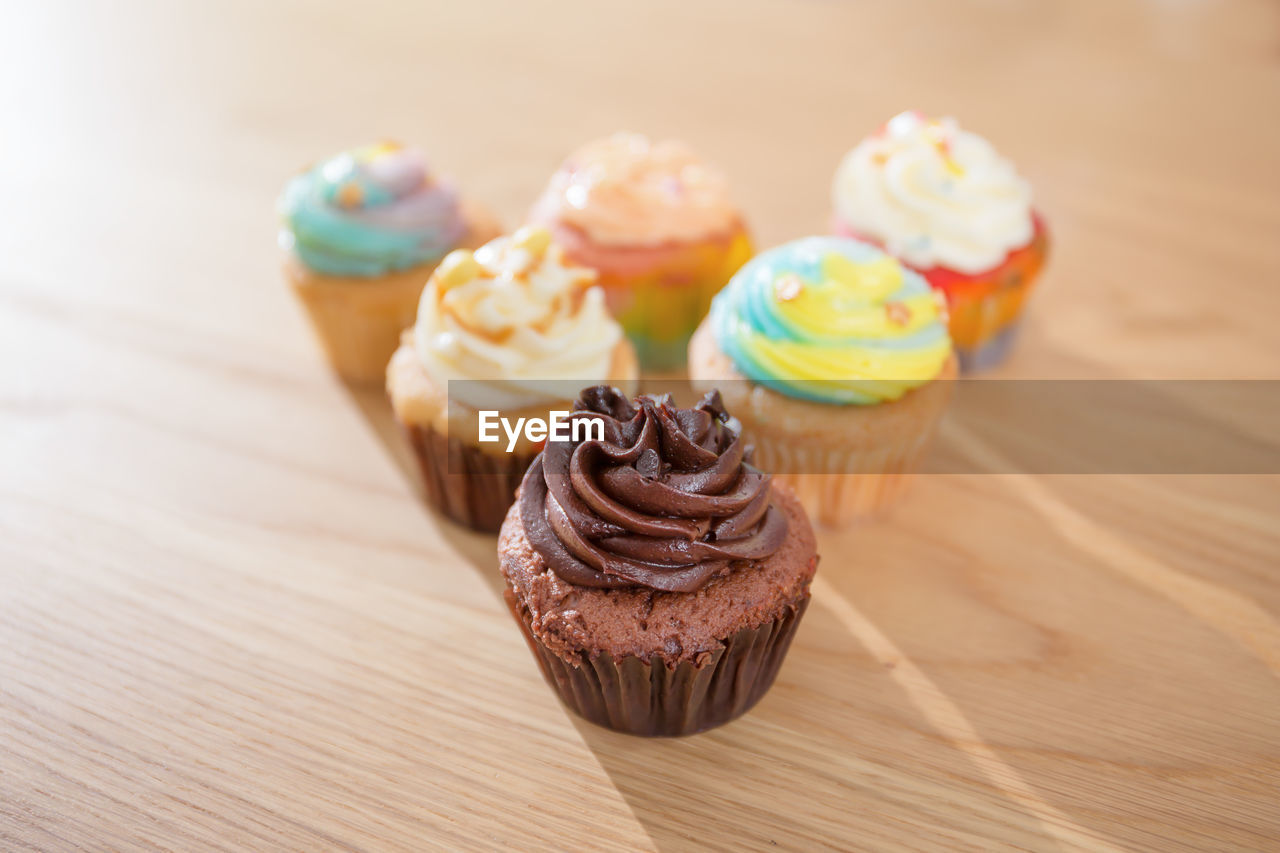 Close-up of cupcakes on table