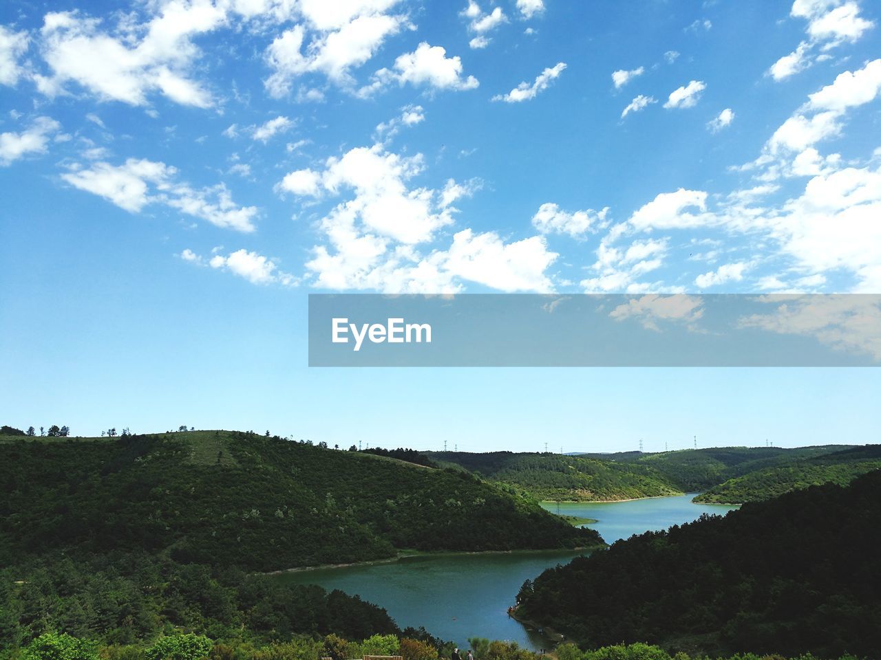 Scenic view of river against sky