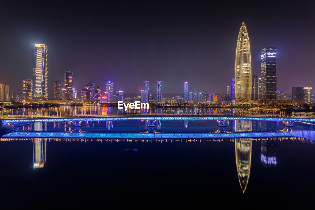 ILLUMINATED BUILDINGS AT NIGHT