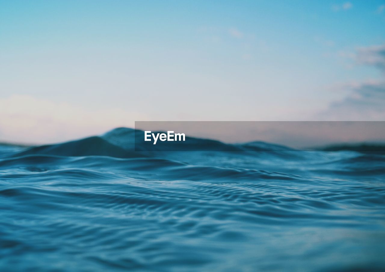 Surface level of sea against sky