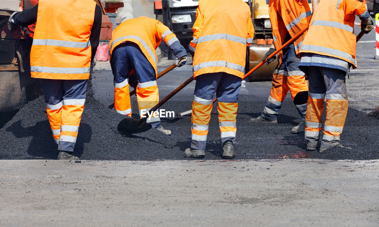 PEOPLE WALKING ON ROAD