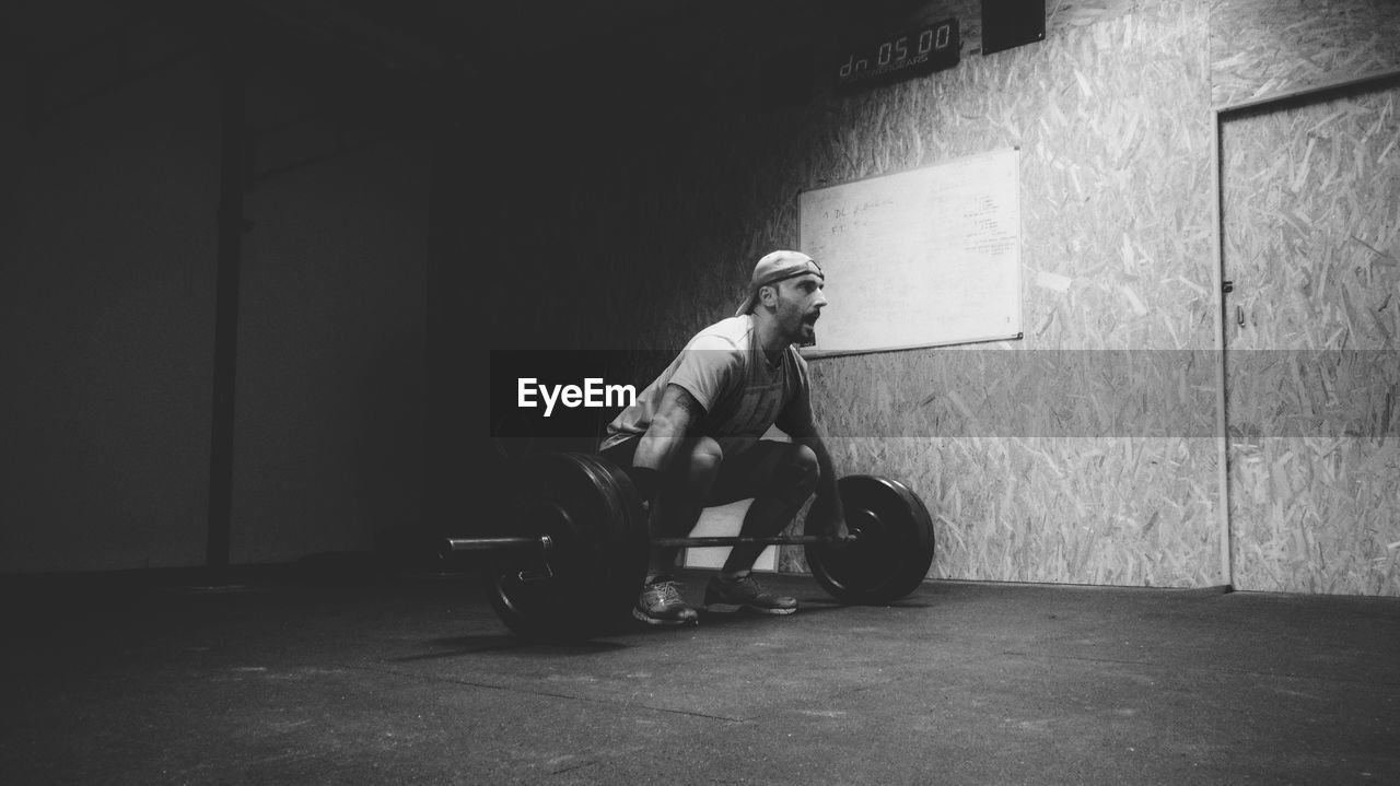 Man weightlifting at gym