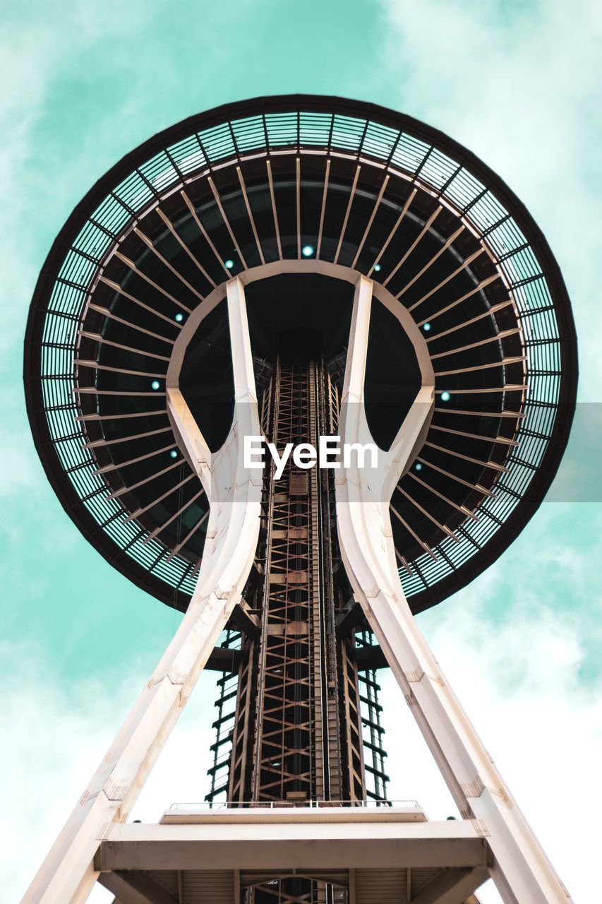 LOW ANGLE VIEW OF METALLIC TOWER AGAINST SKY