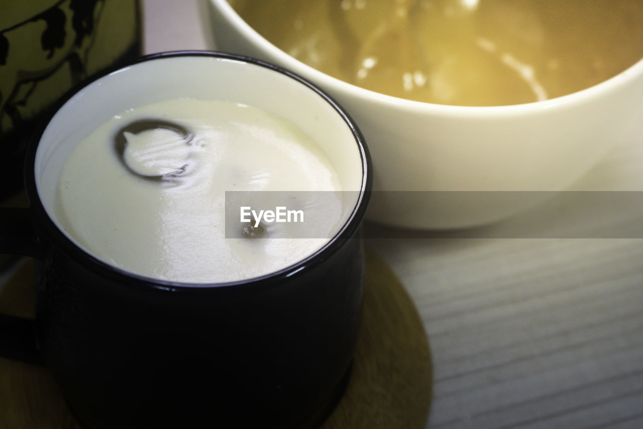 High angle view of coffee cup on table