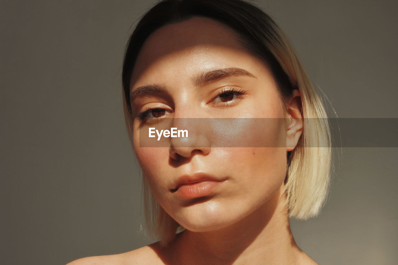 Close-up portrait of beautiful young woman