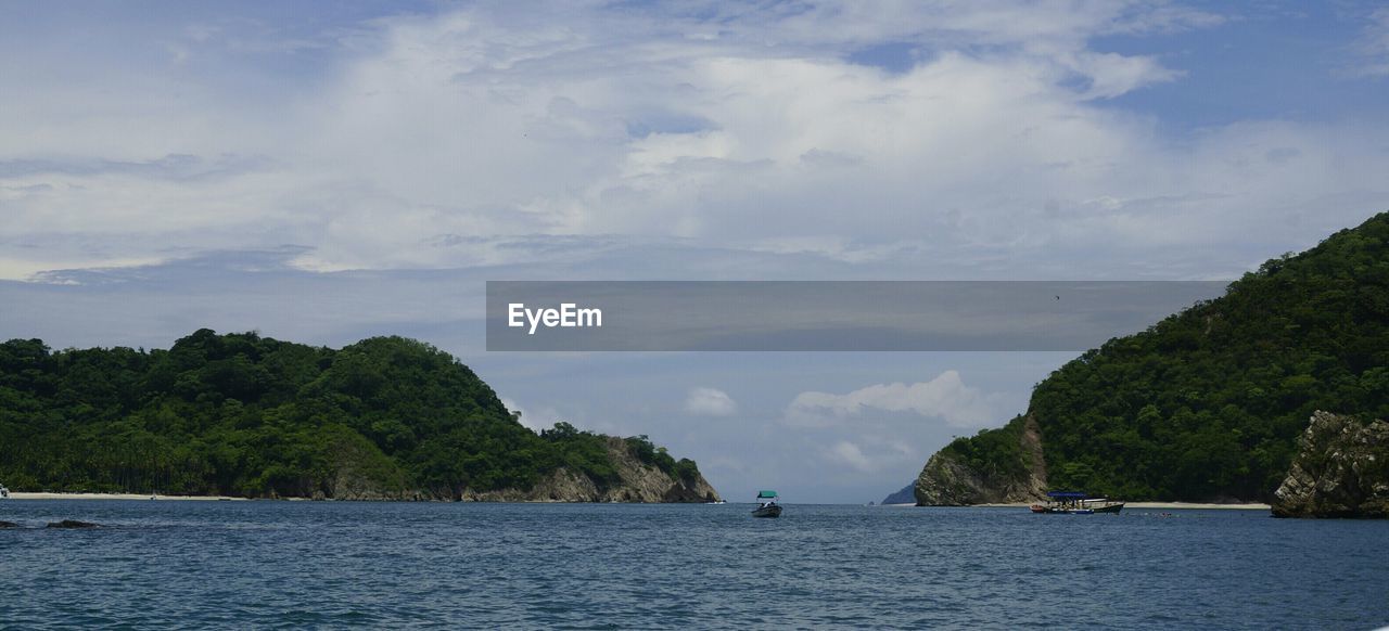 Distant view of boat in sea