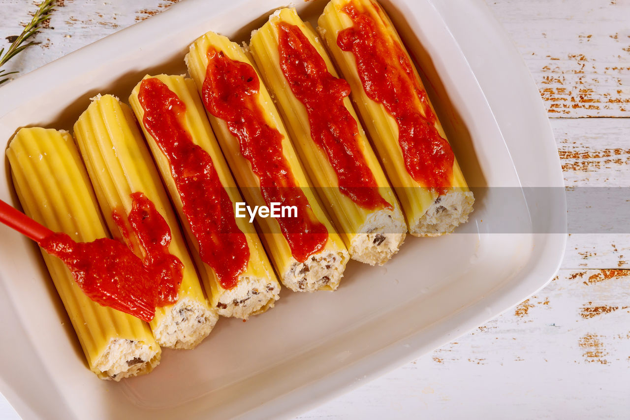 CLOSE-UP OF DESSERT SERVED ON TABLE