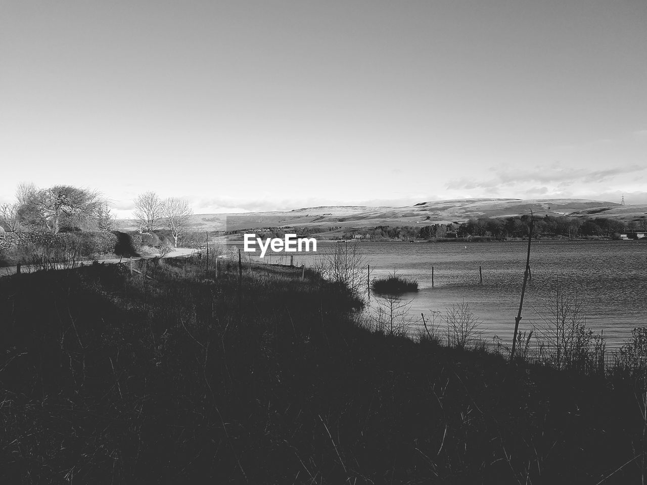 PANORAMIC VIEW OF LAKE AGAINST CLEAR SKY