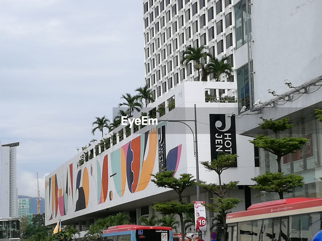 VIEW OF ROAD SIGN AGAINST BUILDINGS