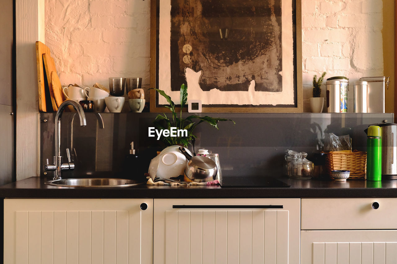 Kitchen interior with clean dishes on the table