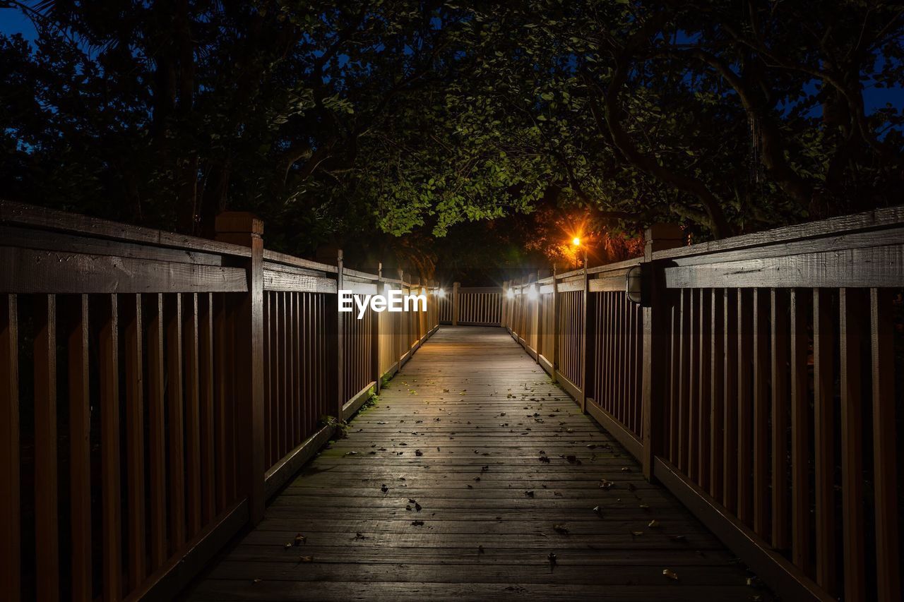 View of footbridge at night
