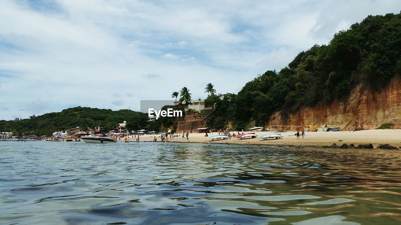 VIEW OF SEA AGAINST CLOUDY SKY