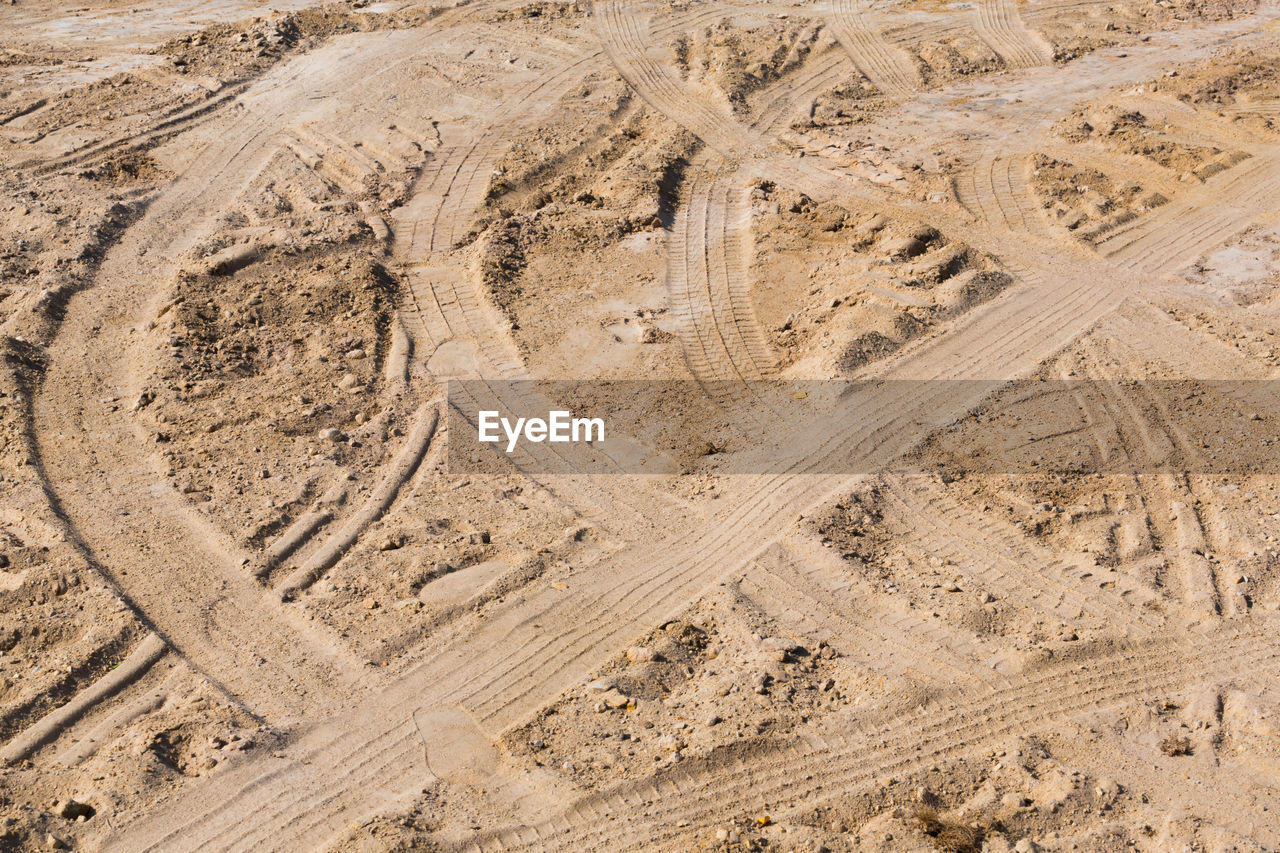 AERIAL VIEW OF TIRE TRACKS ON DESERT