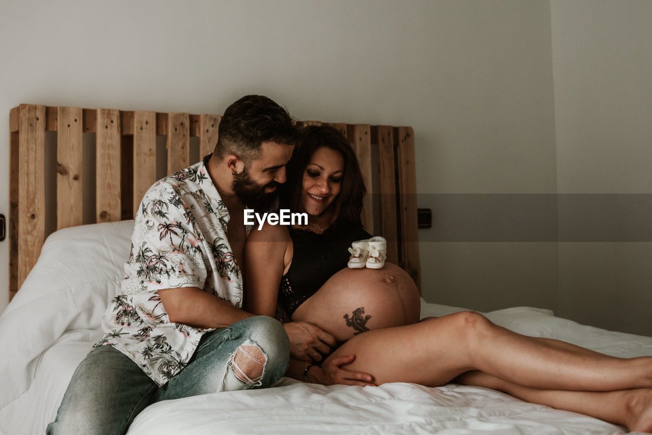 Young pregnant couple waiting for the baby. pregnancy session