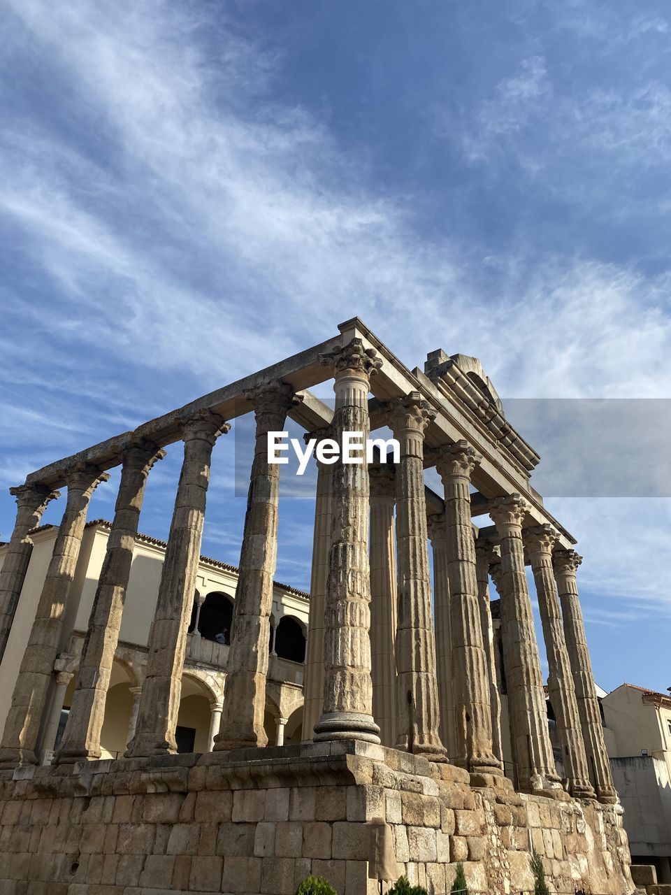 Low angle view of roman temple against sky