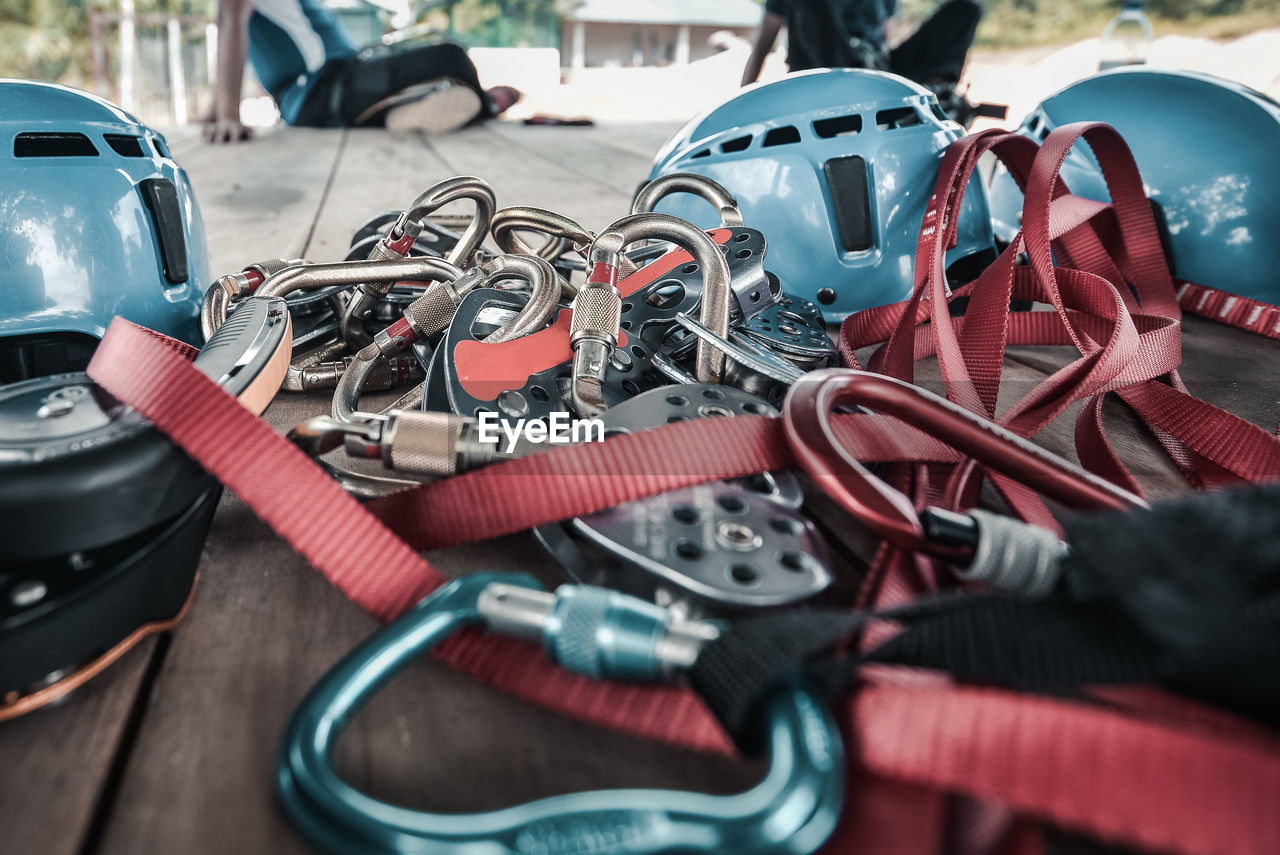 Close-up of climbing equipment on table