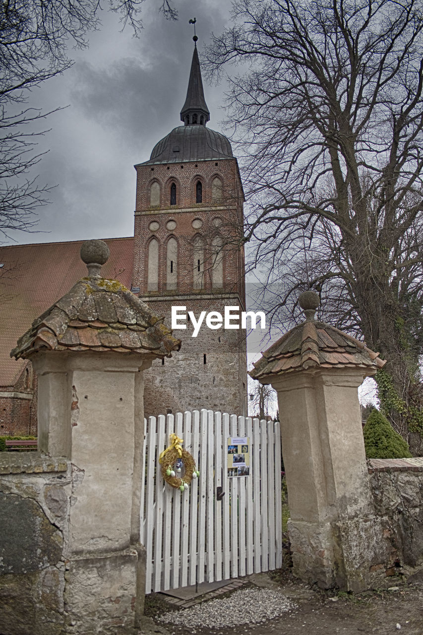 LOW ANGLE VIEW OF CHURCH WITH CHURCH IN BACKGROUND