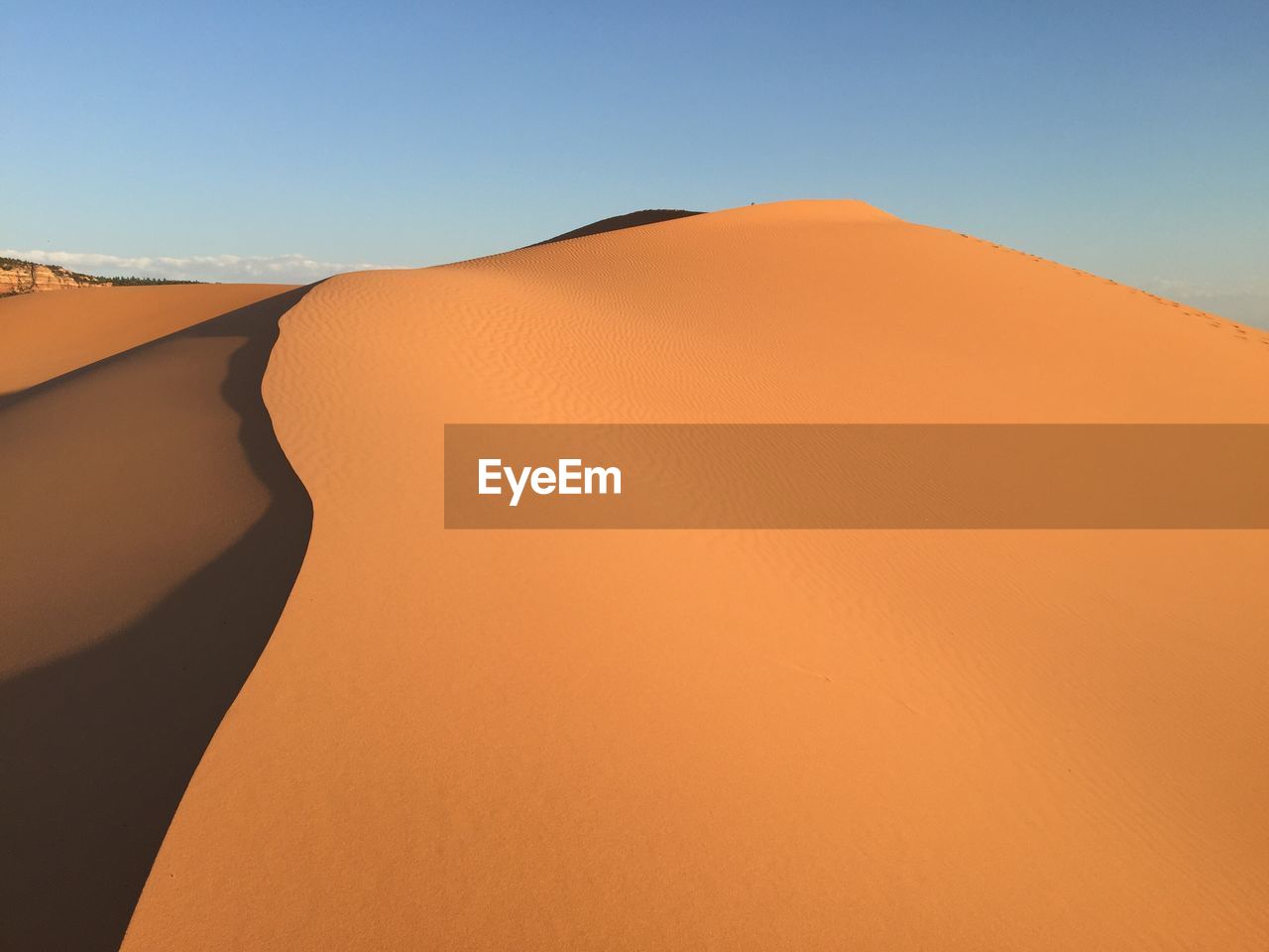 Red sand dune and blue sky 