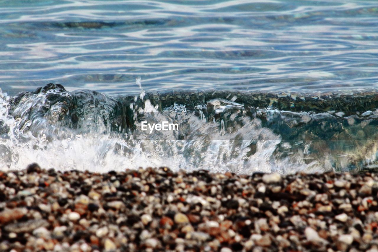 WAVE SPLASHING ON SHORE