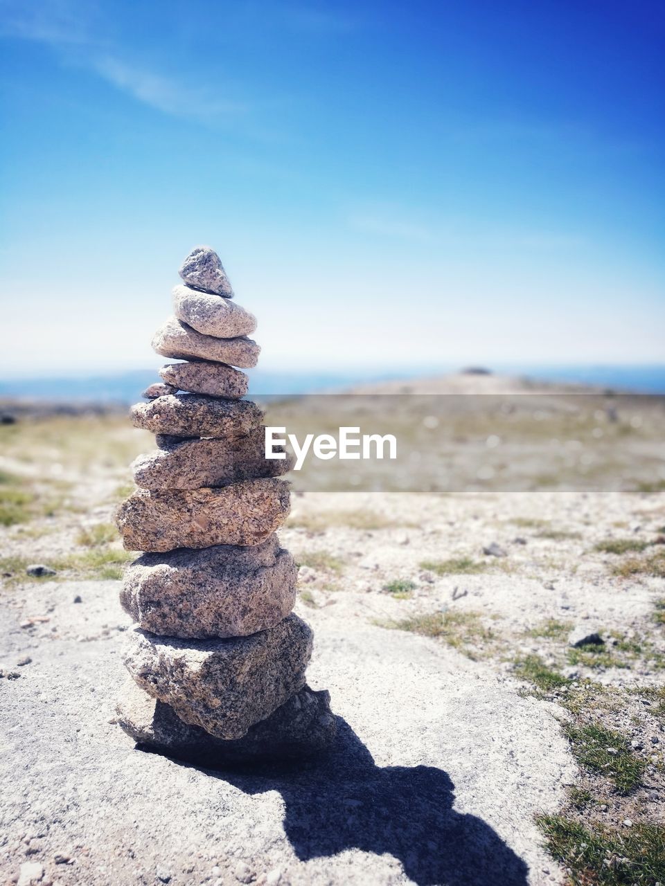 STACK OF PEBBLES ON SHORE