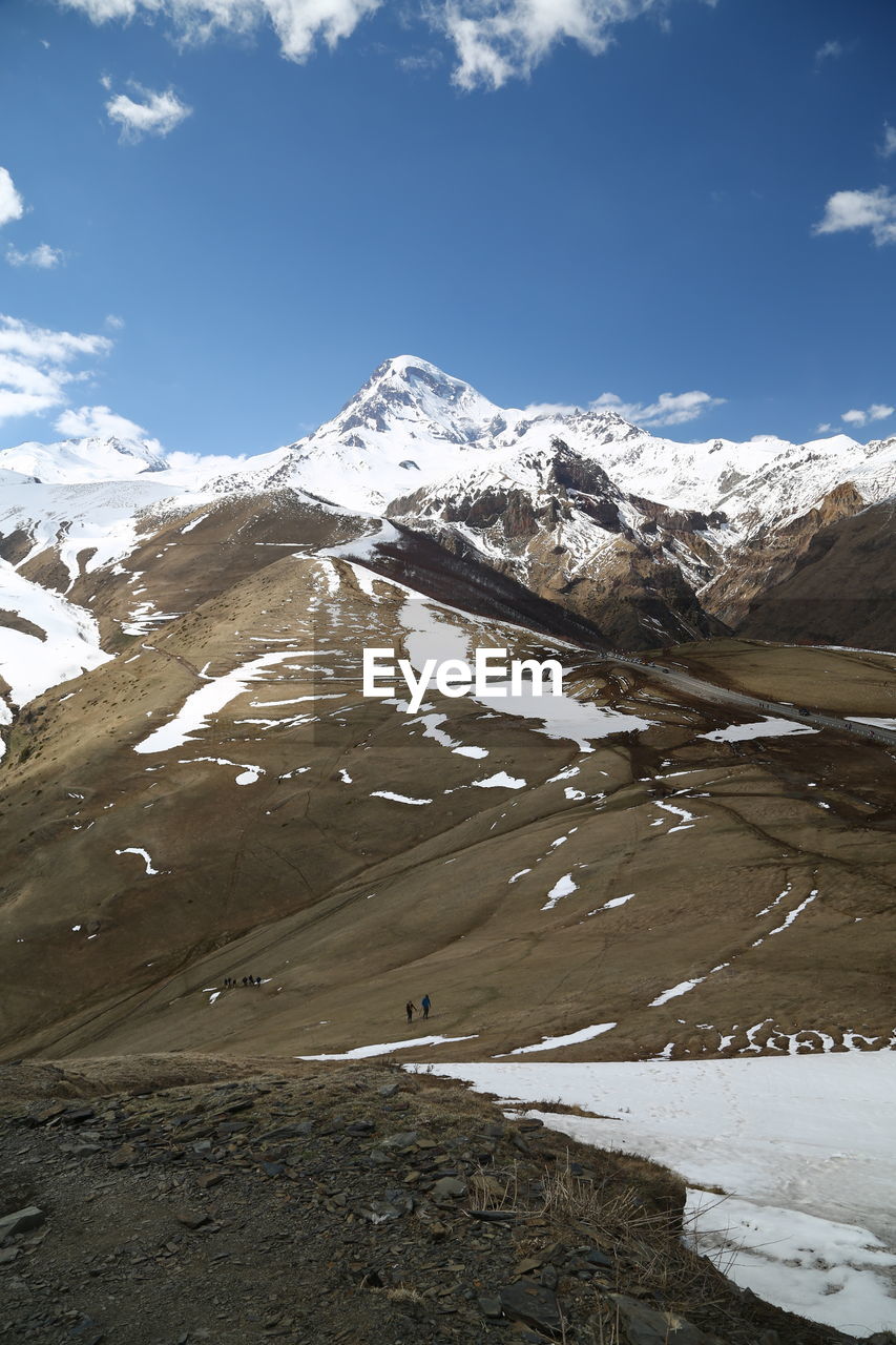 SNOWCAPPED MOUNTAIN AGAINST SKY