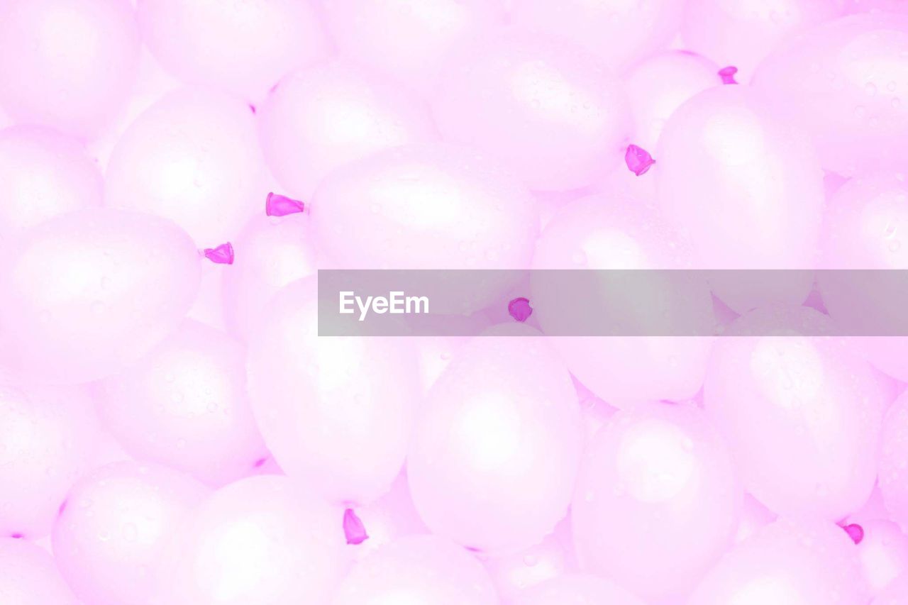 Full frame shot of pink balloons