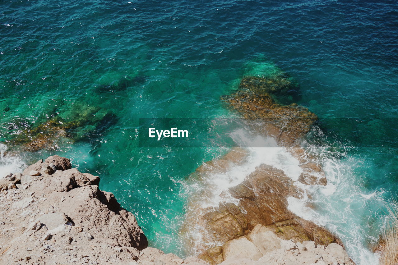 High angle view of rocky shore