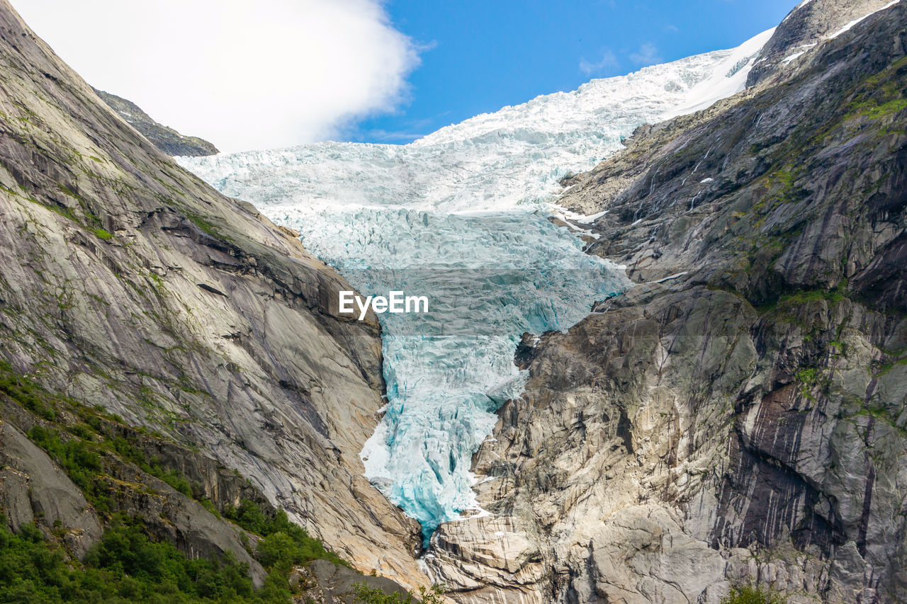 Briksdal or briksdalsbreen glacier with melting blue ice, norway nature landmark