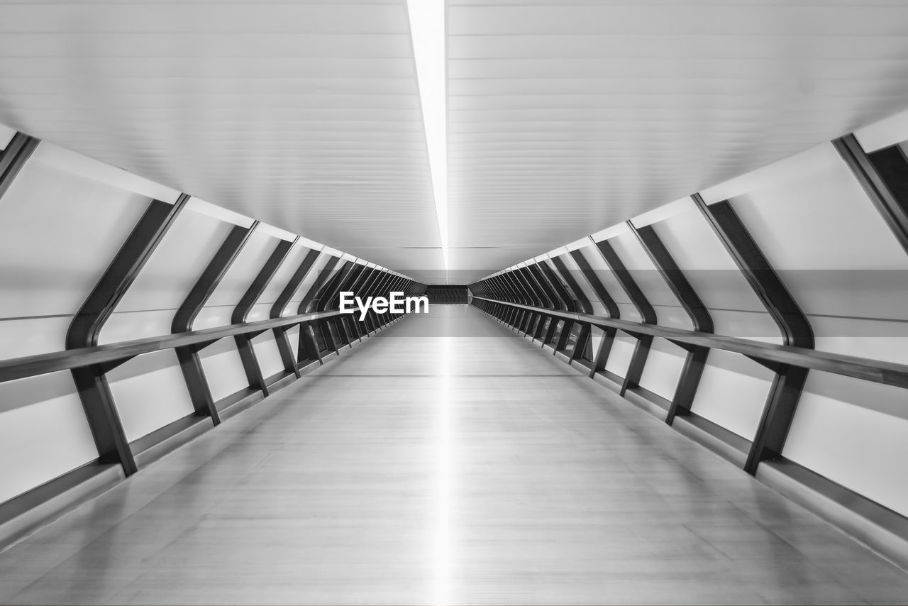 Empty subway along railings