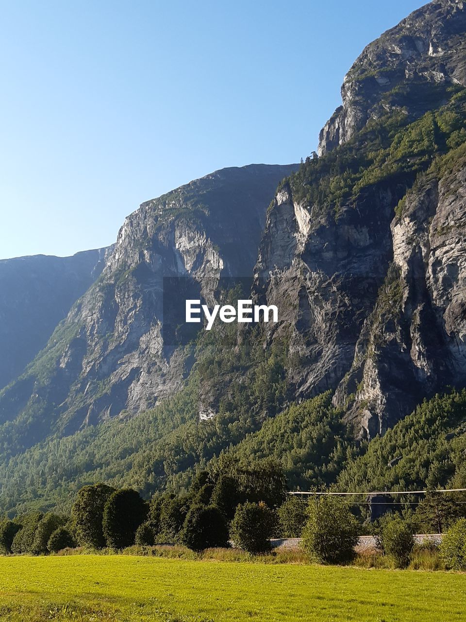 Scenic view of mountains against clear sky