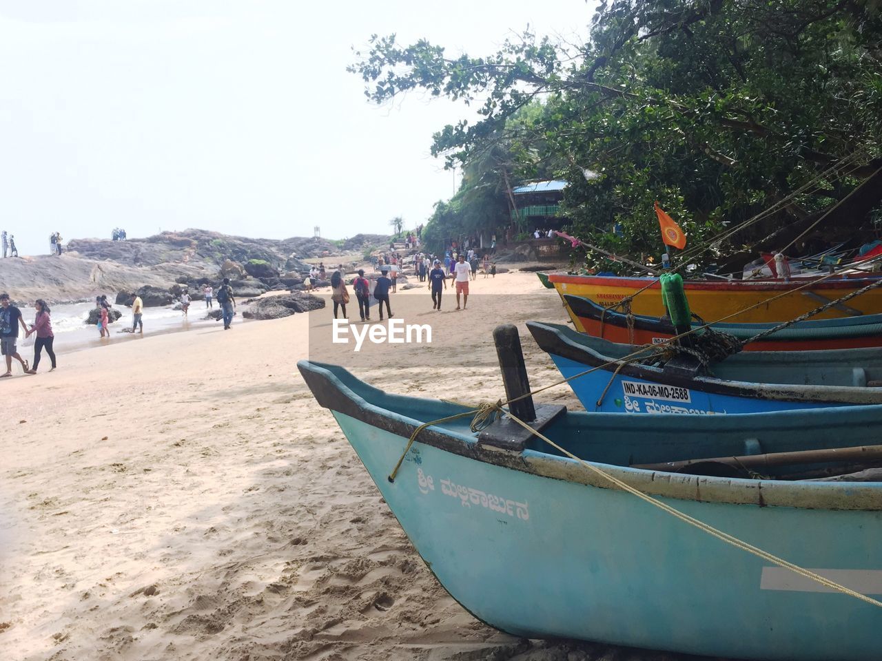 PANORAMIC VIEW OF PEOPLE ON BEACH