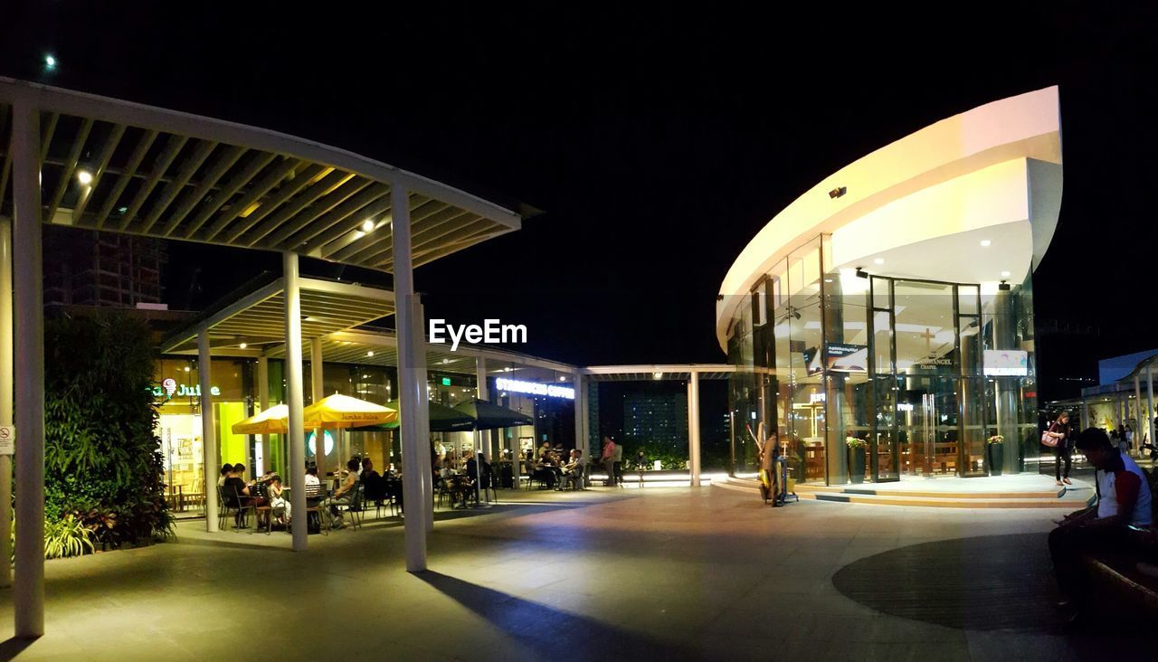 ILLUMINATED BUILDING AT NIGHT