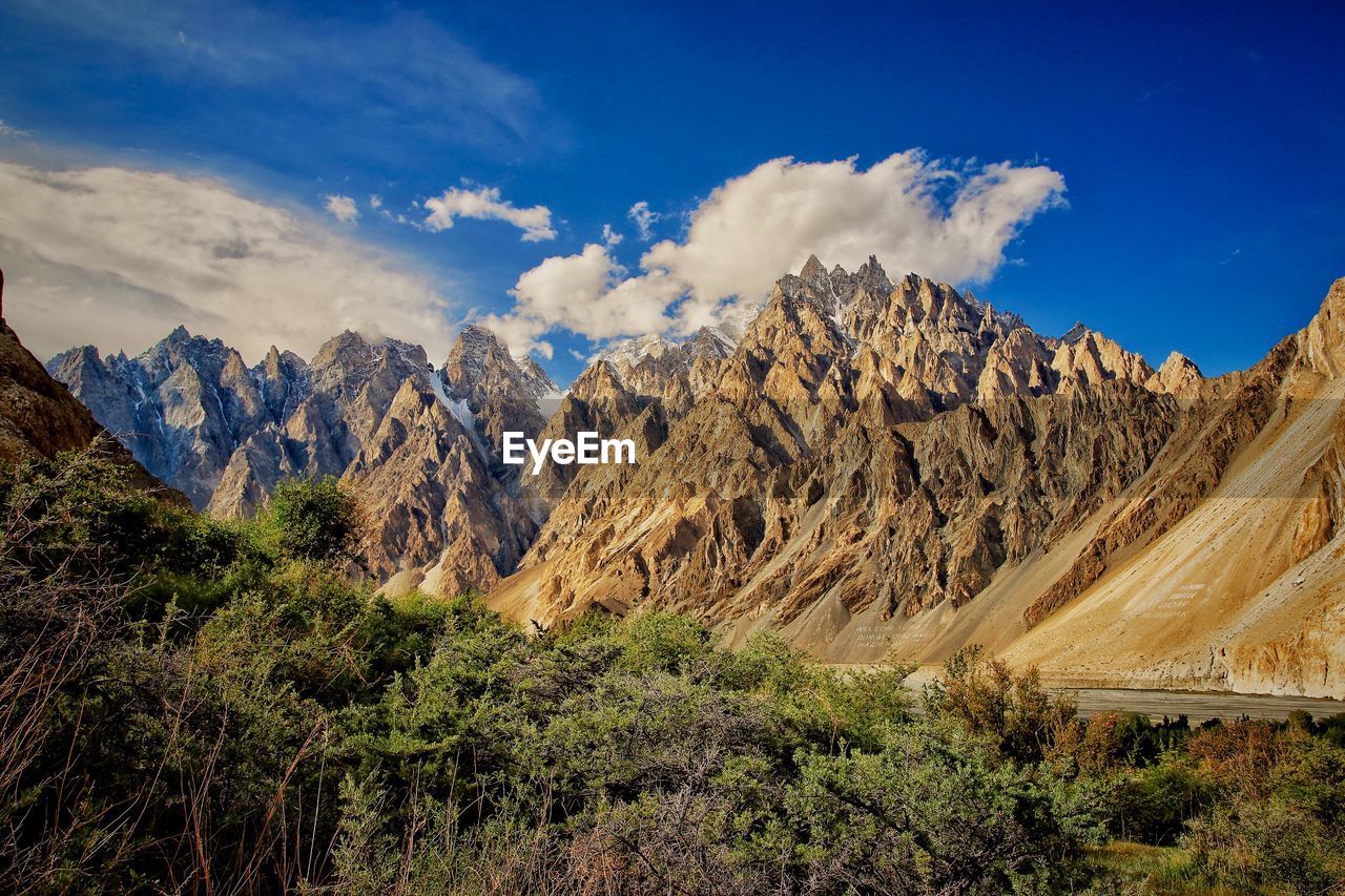 Panoramic view of landscape and mountains against sky