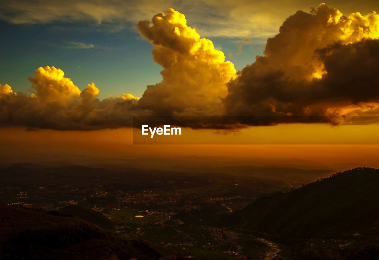 Scenic view of dramatic sky during sunset