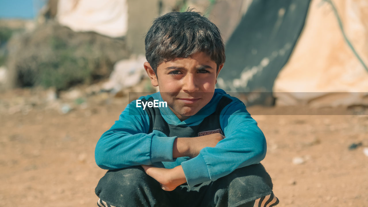 Portrait of child in a syrian refugee camp. 