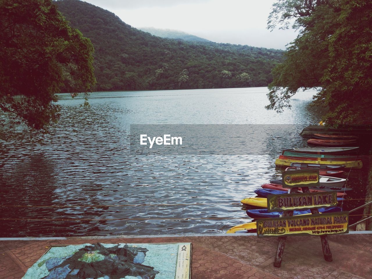 SCENIC VIEW OF LAKE AND MOUNTAINS