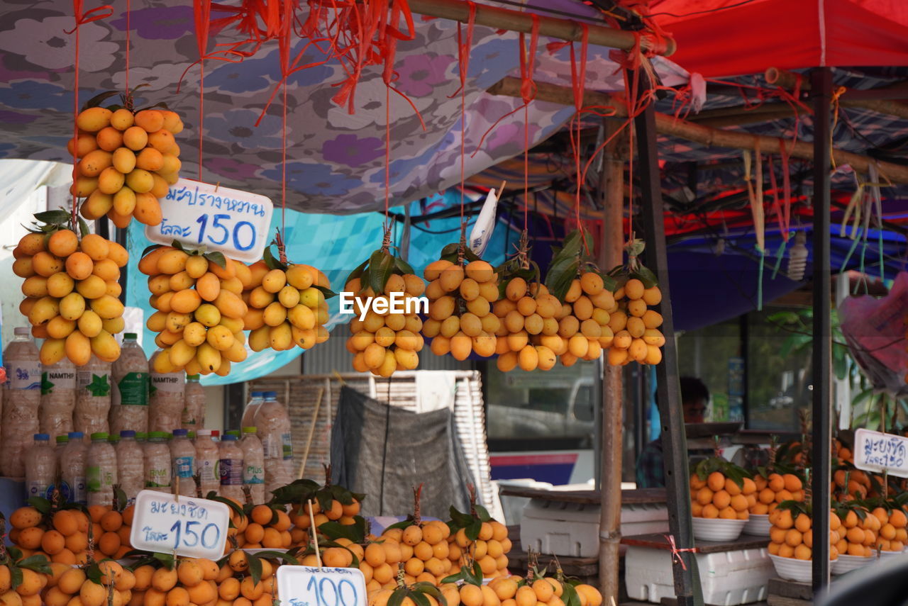 Various fruits for sale at market stall