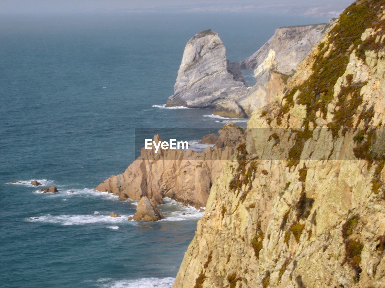 Scenic view of sea and rock formation