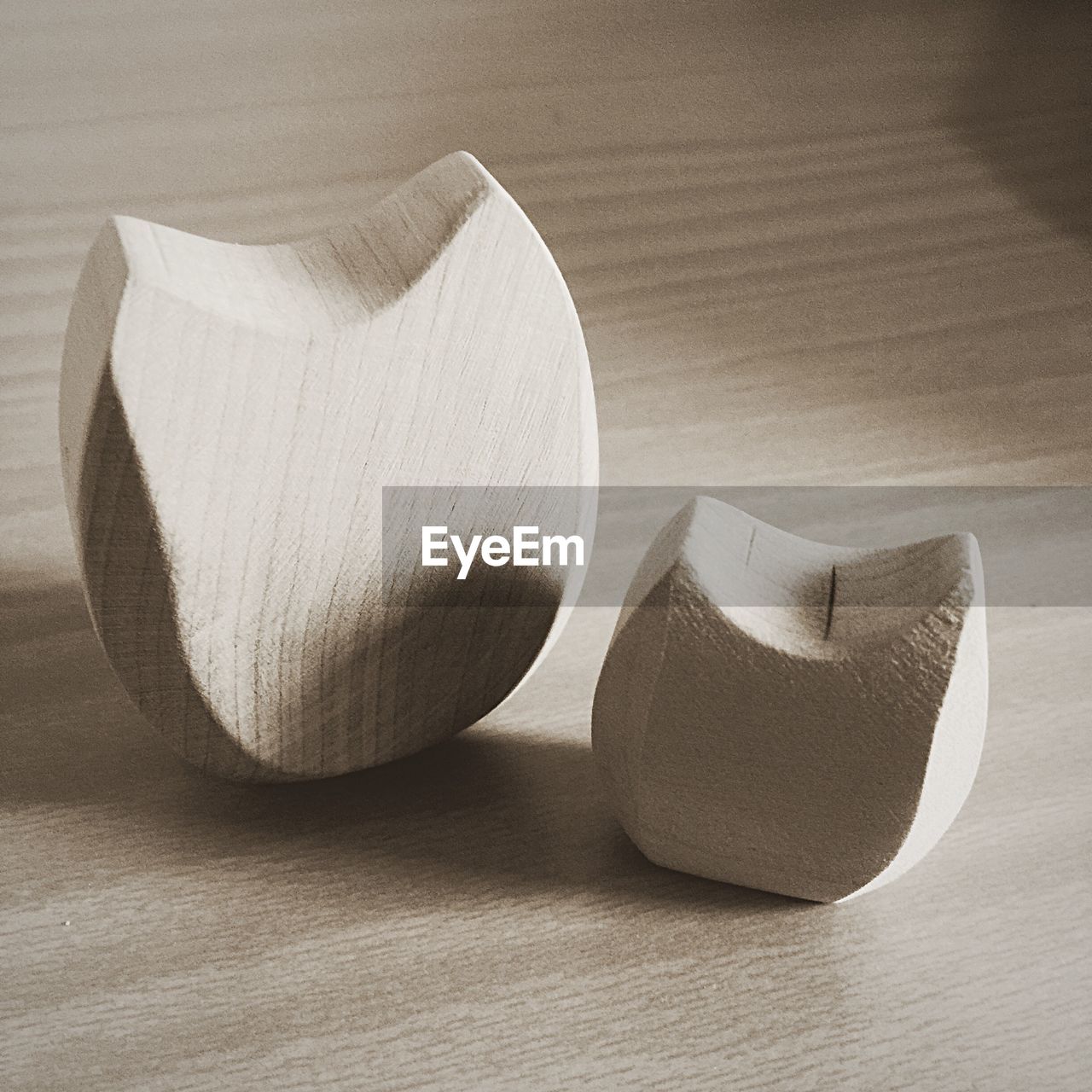 High angle close-up of wooden objects on table