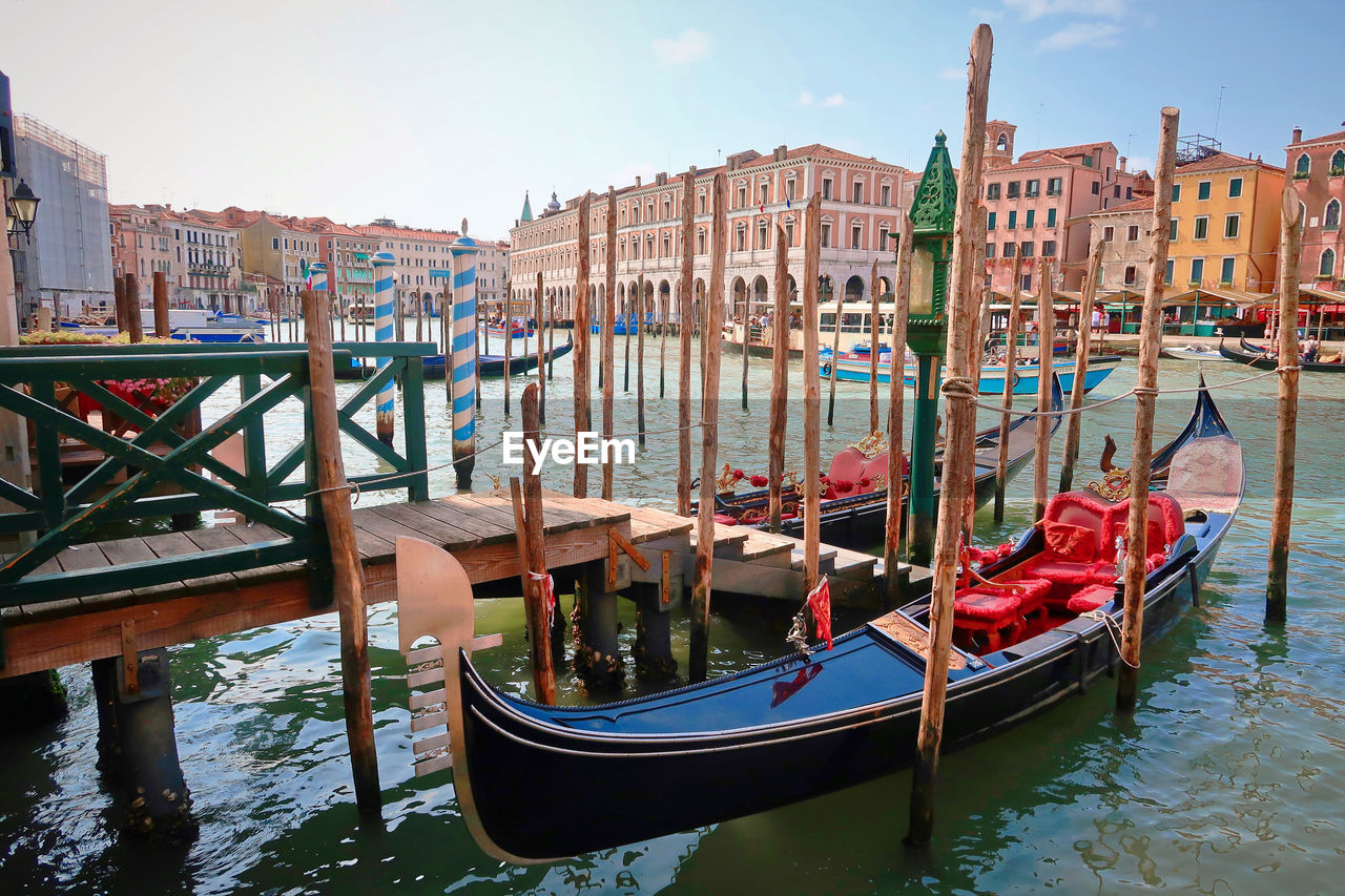 Gondolas moored in canal