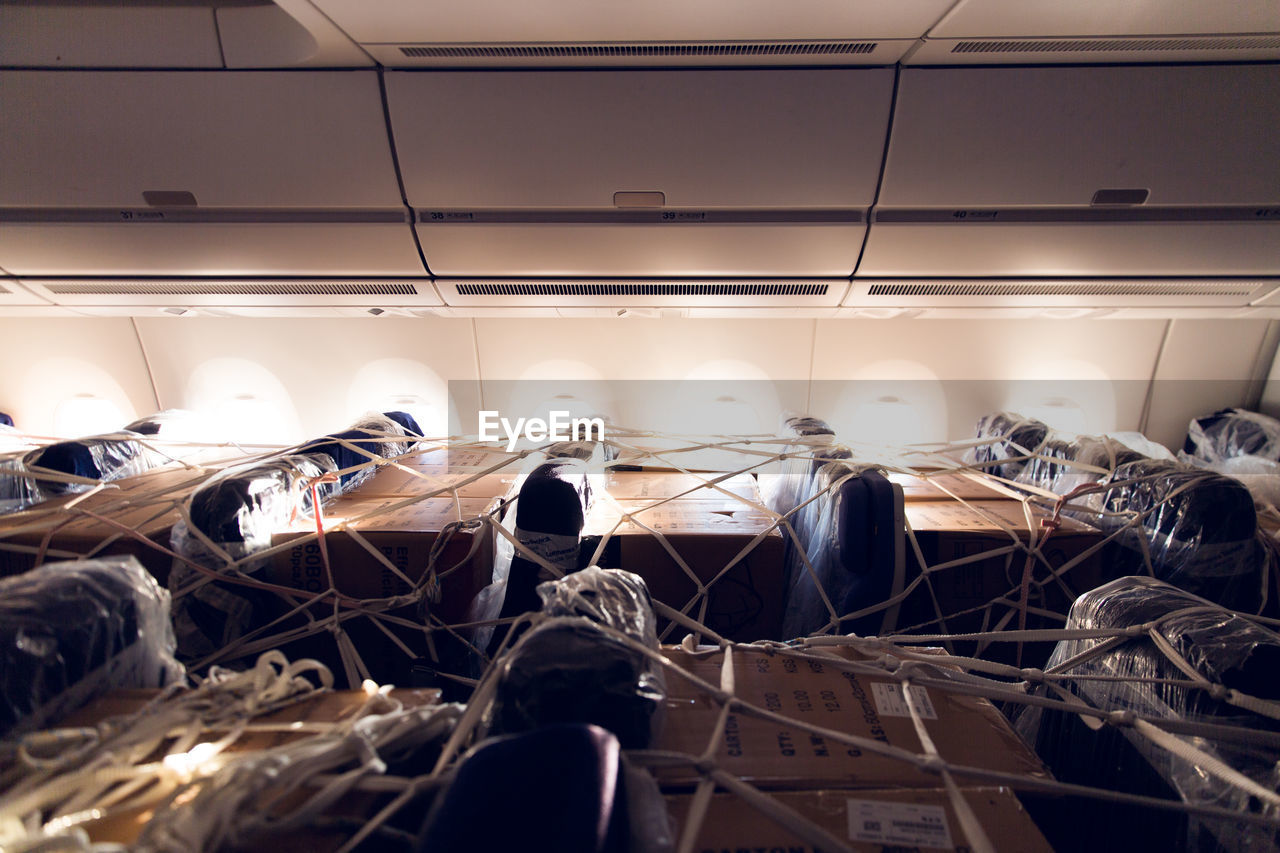 Cargo on seats in a passenger plane