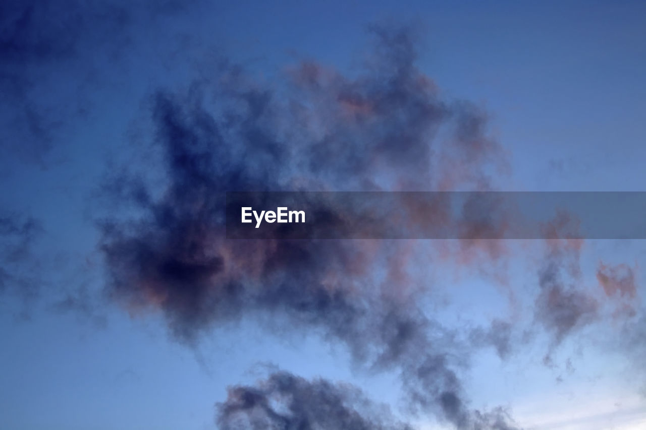 LOW ANGLE VIEW OF CLOUDS IN BLUE SKY