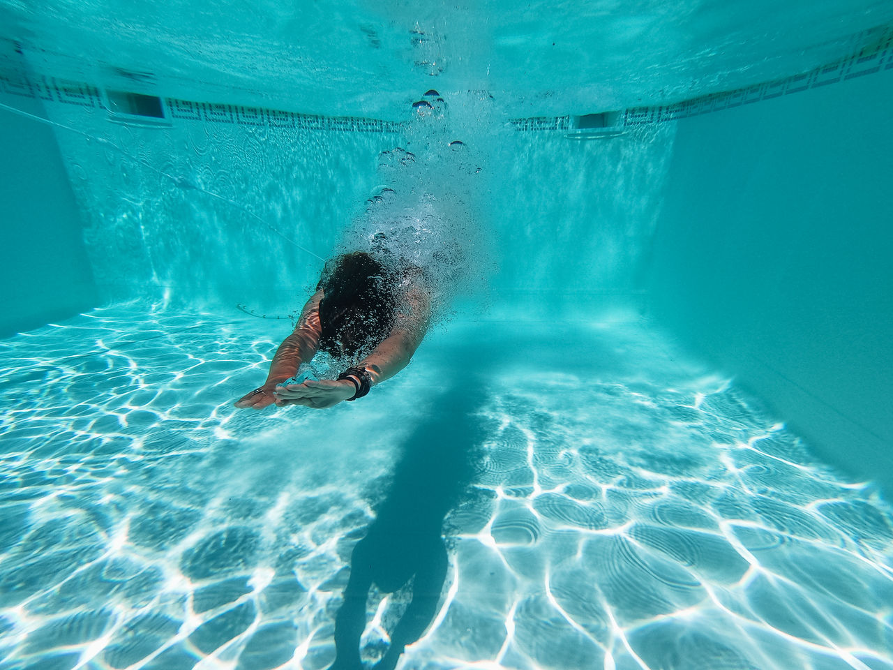 Woman swimming in pool