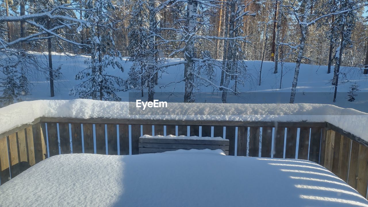 winter, cold temperature, snow, tree, nature, plant, no people, freezing, day, frozen, white, architecture, ice, railing, beauty in nature, tranquility, built structure, scenics - nature, tranquil scene, outdoors, environment, bare tree, covering, land, blue